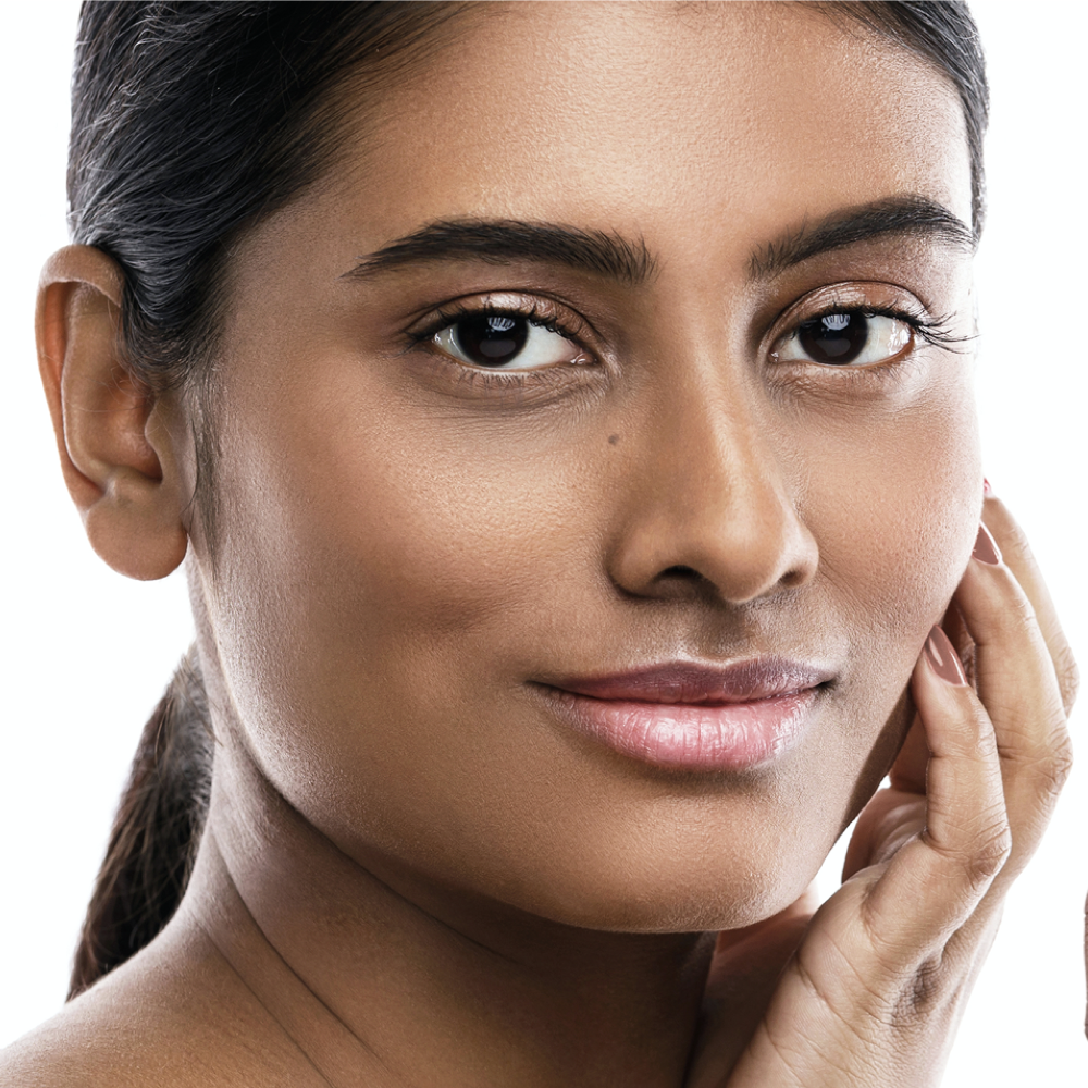 Woman with smooth, glowing skin, results from microdermabrasion at Dandelion Medical Aesthetics in Littleton, CO